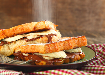 delicious banana chocolate sandwich with powdered sugar sprinkles perfect for breakfast treats and desserts number 9 recipes