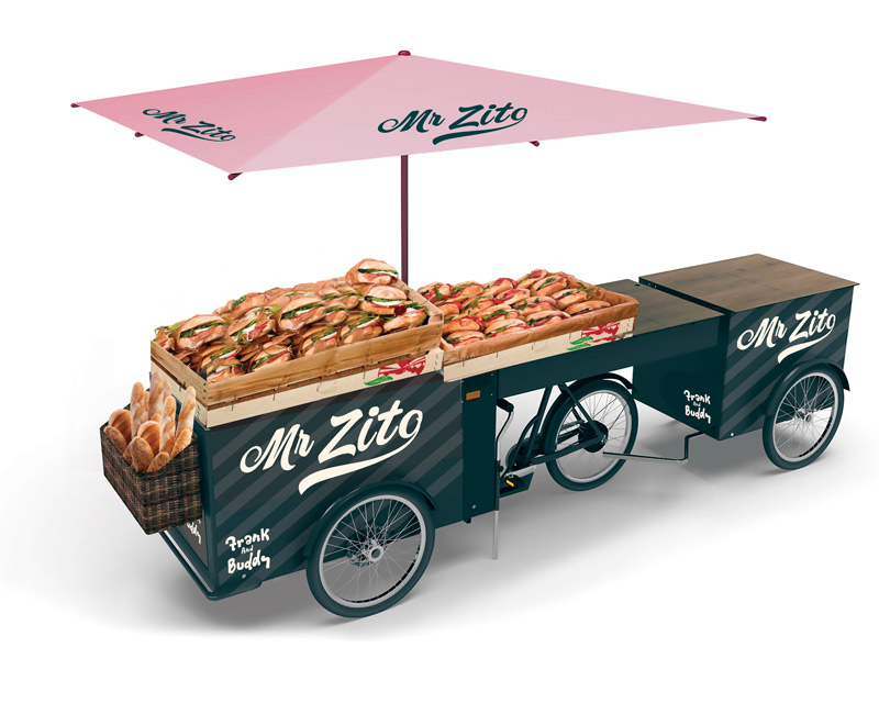 a food cart named Mr Zito featuring various types of sandwiches under a pink umbrella perfect for outdoor food events and gatherings